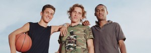 Three teen friends looking at camera